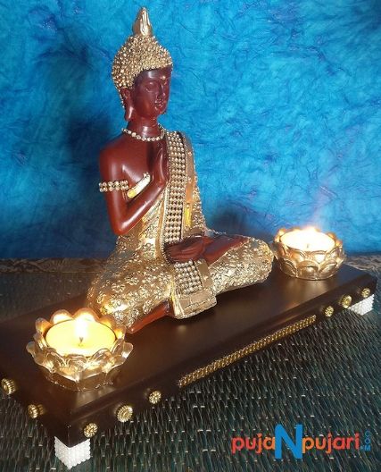 Meditating Buddha Statue on Wooden Tray