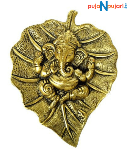 Golden Ganesh Statue on Leaf