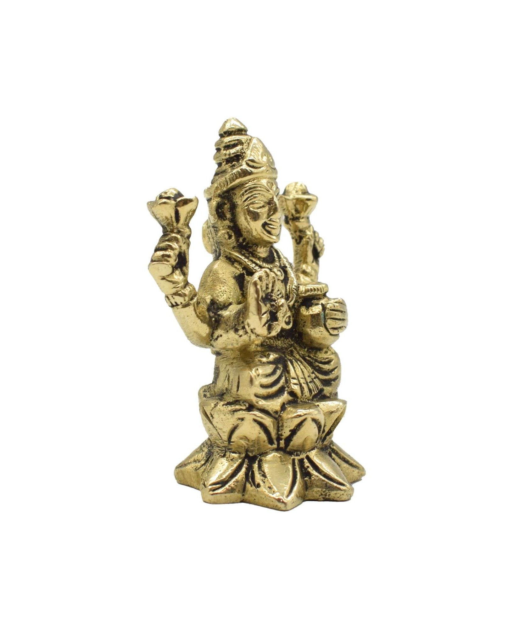 Brass Lakshmi Devi sitting on lotus