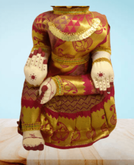 Varamahalakshmi Idol Gold and Pink Saree- Puja N Pujari