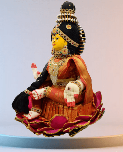 varamahalakshmi doll with full decoration in orange