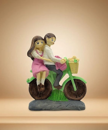 Love Couple Showpiece Sitting on Cycle forHome Decor Valentine Gift