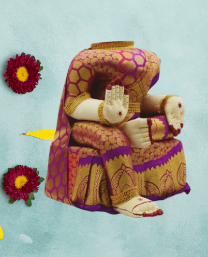varamahalakshmi idol with violet and gold saree
