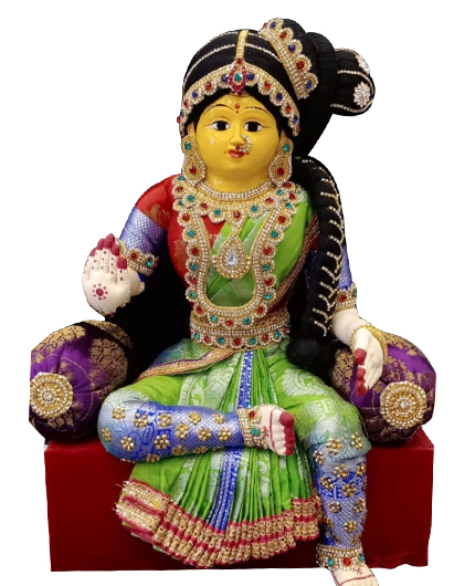 Varamahalakshmi Idol With Ornaments in Green And Red Saree